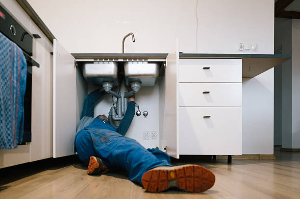 Professional Drain Cleaning technician working in Afton, OK